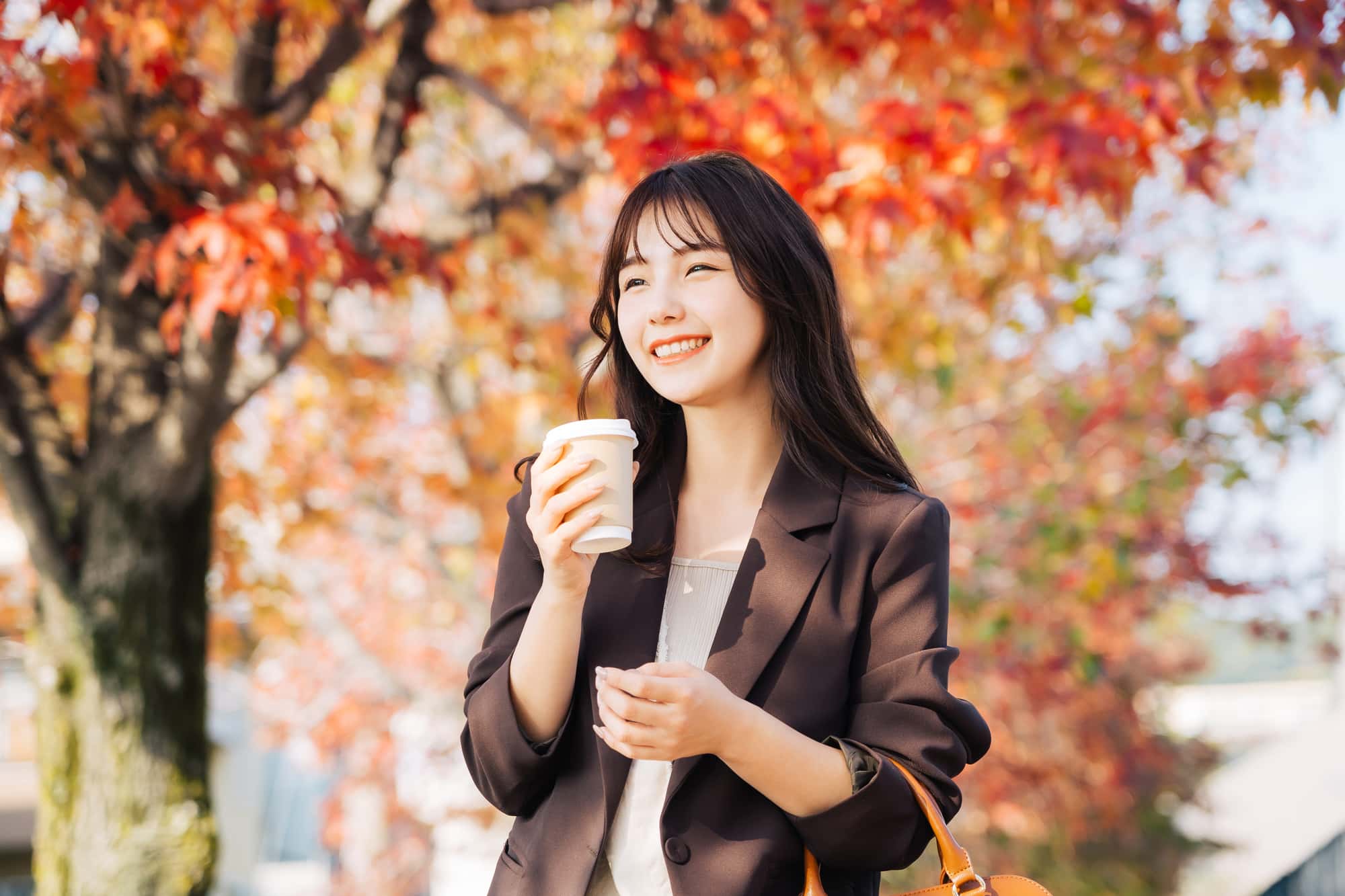 審美歯科治療で美しい歯になった女性