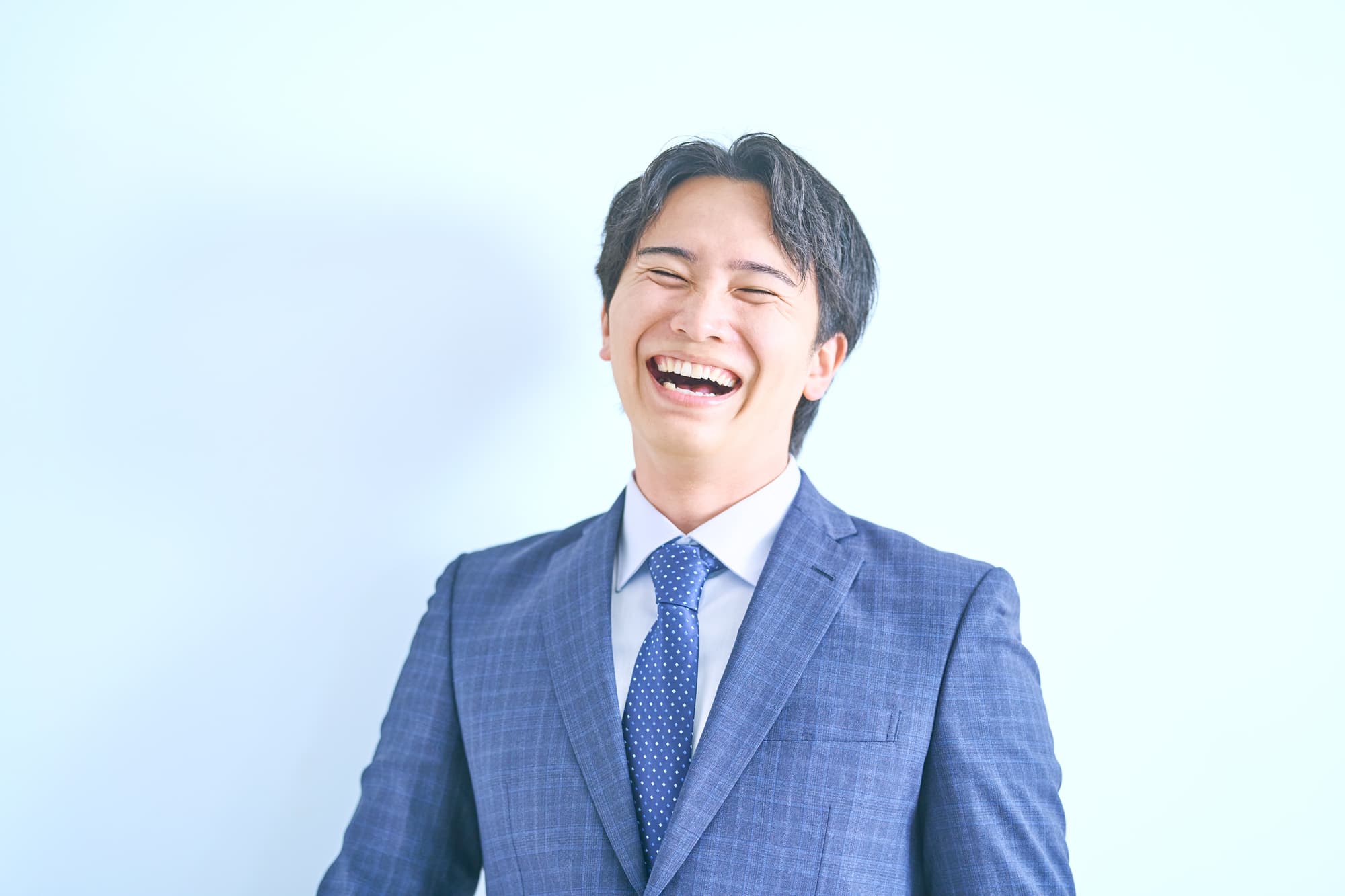 顎関節症が治って笑顔の会社員